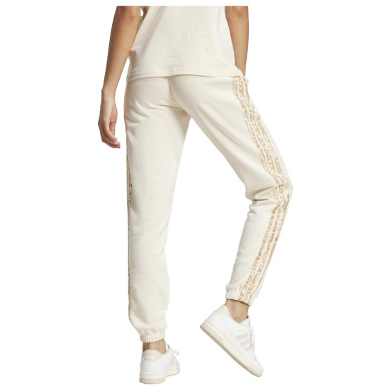 Adidas Γυναικείο παντελόνι φόρμας Essentials Seasonals Animal 3-Stripes French Terry Pants Adidas Γυναικείο παντελόνι φόρμας Essentials Seasonals Animal 3-Stripes French Terry Pants